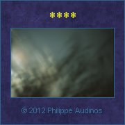Image n39 - Nuages photographis de nuit  travers le feuillage d'un arbre
