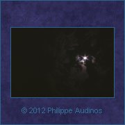 Image n49 - Lune scintillant  travers les nuages